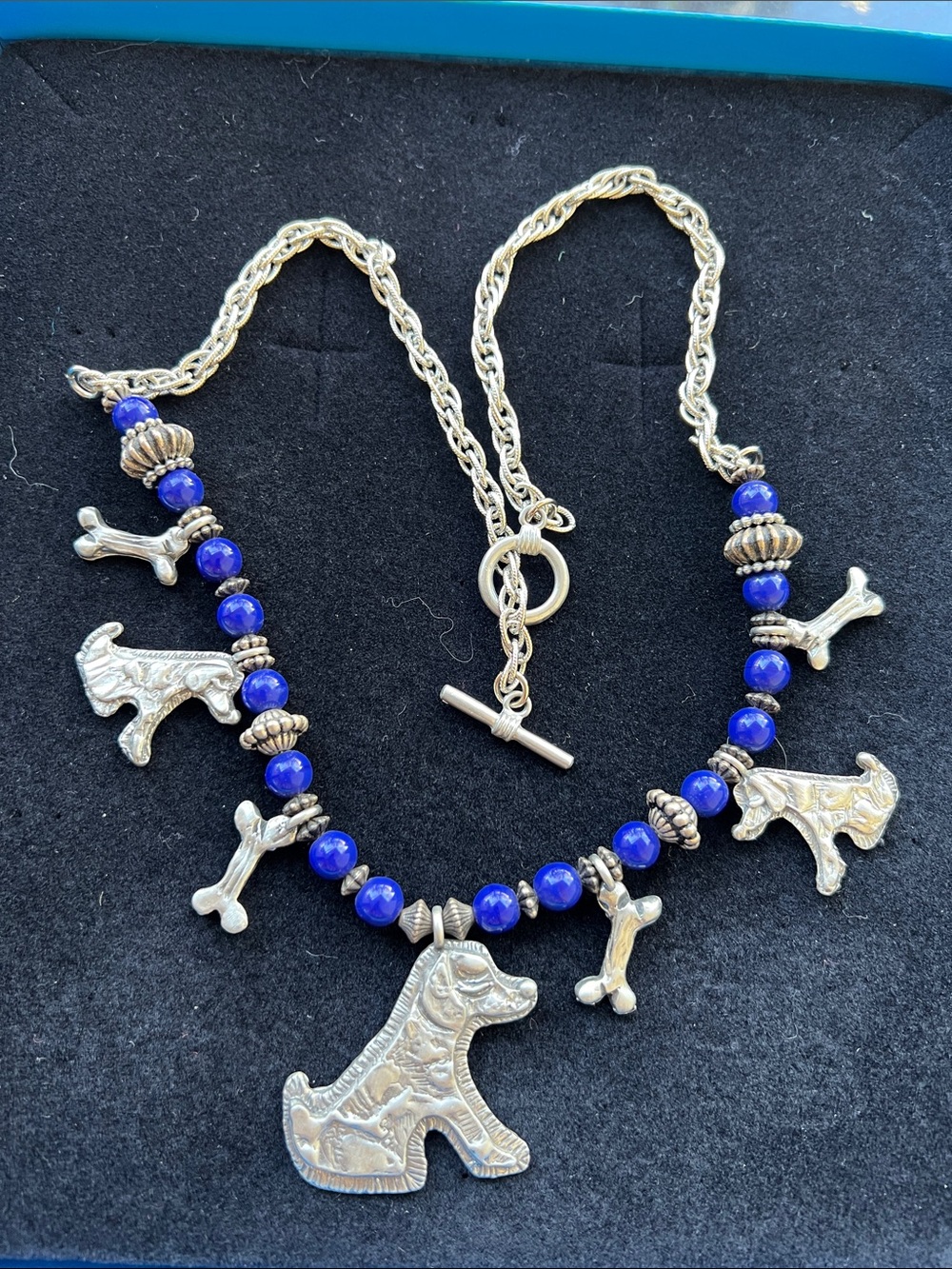 vintage pewter dog and bone charm necklace by the brand Marcie USA.